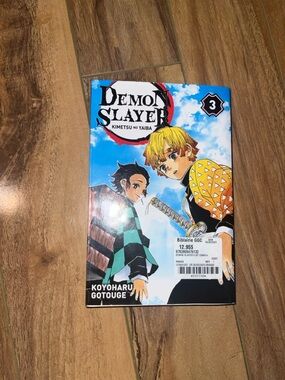 Demon Slayer Vol. 3 Manga Book - Blue, Yellow, Black French manga